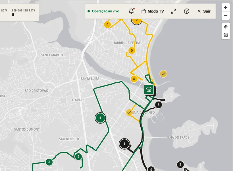 Painel do ZecaOn, central de operação: o mapa com as 3 rotas na rua, as paradas entregues marcadas e o botão do modo TV.